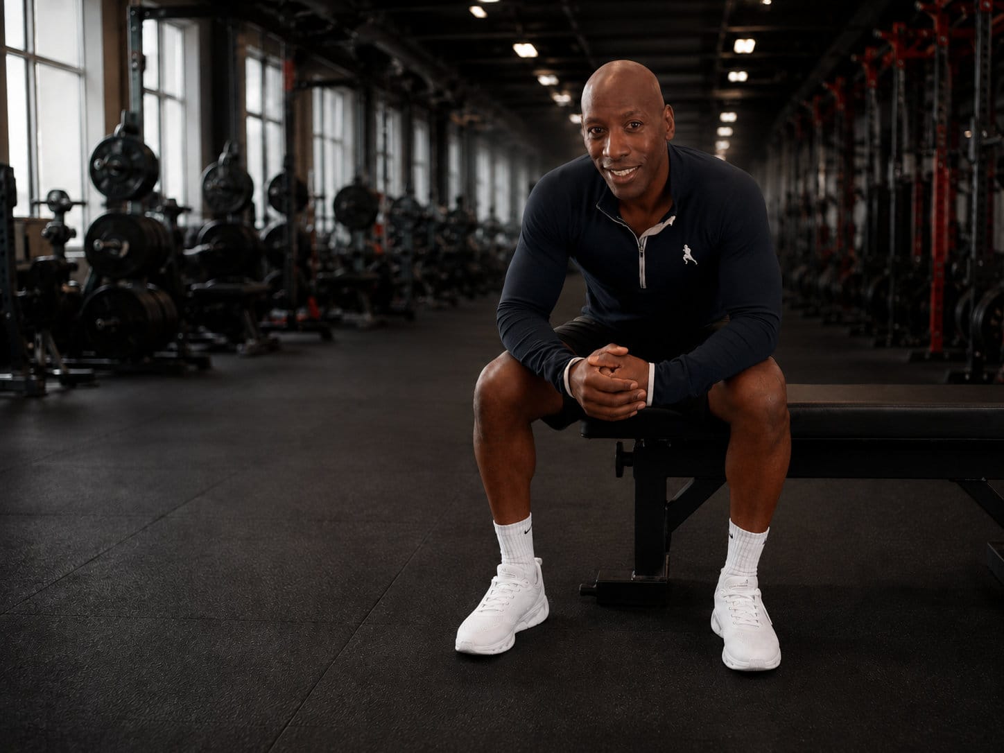 Mikey Spice seated in the Bodysharp gym
